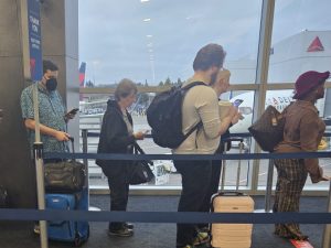 Mom waiting to board